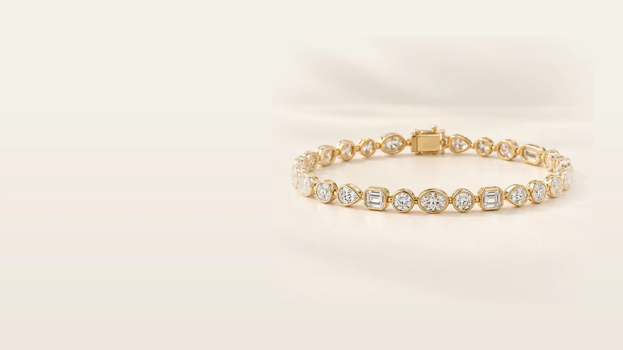 Multi-shape bezel Lab-Grown Diamond bracelet in a pool of soft daylight